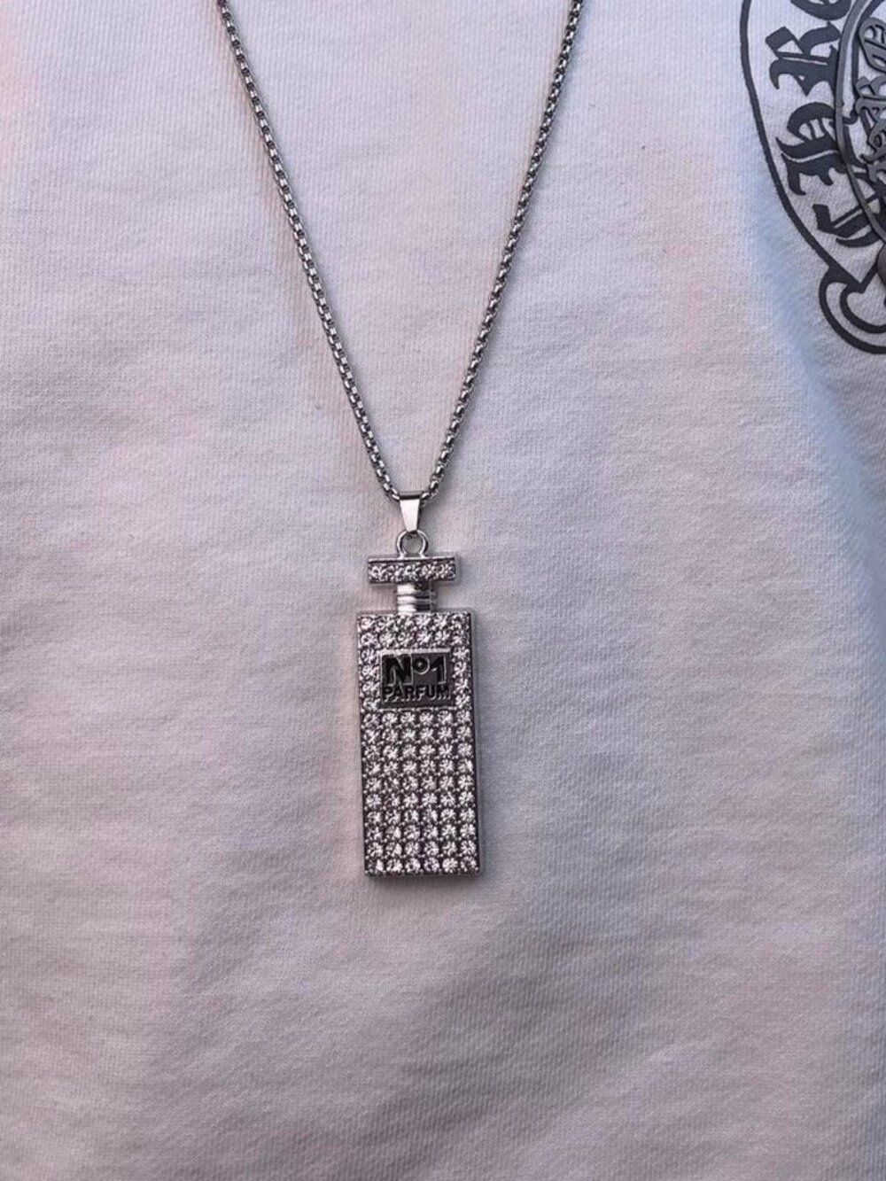 Silver perfume bottle pendant necklace